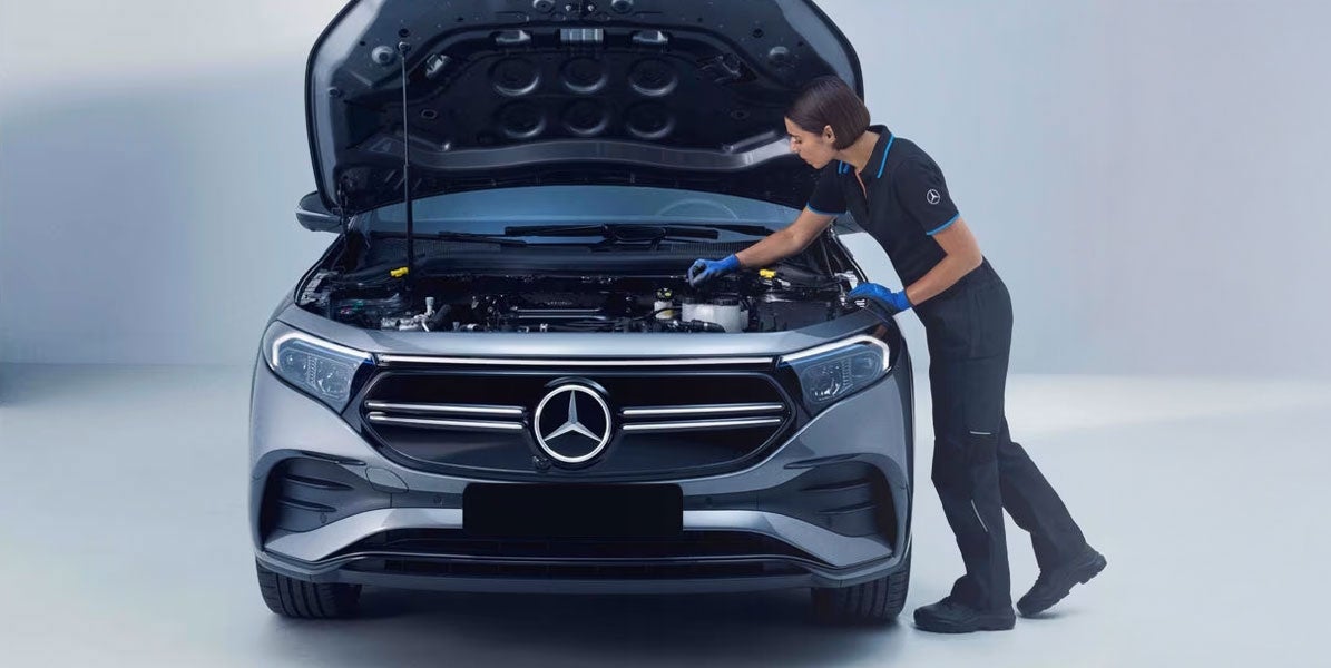 Black Mercedes-Benz being serviced